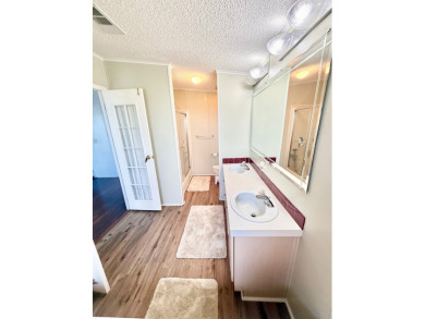 BRING YOUR OFFER ON THIS EXQUISITE LAKEFRONT HOME IN A GATED on Cypress Greens in Florida - for sale on GolfHomes.com, golf home, golf lot