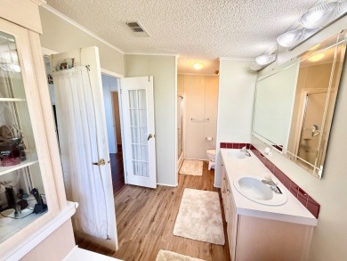 BRING YOUR OFFER ON THIS EXQUISITE LAKEFRONT HOME IN A GATED on Cypress Greens in Florida - for sale on GolfHomes.com, golf home, golf lot