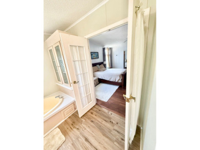 BRING YOUR OFFER ON THIS EXQUISITE LAKEFRONT HOME IN A GATED on Cypress Greens in Florida - for sale on GolfHomes.com, golf home, golf lot