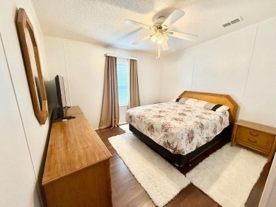 BRING YOUR OFFER ON THIS EXQUISITE LAKEFRONT HOME IN A GATED on Cypress Greens in Florida - for sale on GolfHomes.com, golf home, golf lot