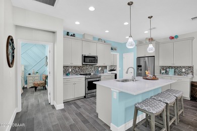 Beautiful Turn-Key Camellia Cottage offering 2 bedrooms, 2 baths on LPGA International Golf Course in Florida - for sale on GolfHomes.com, golf home, golf lot