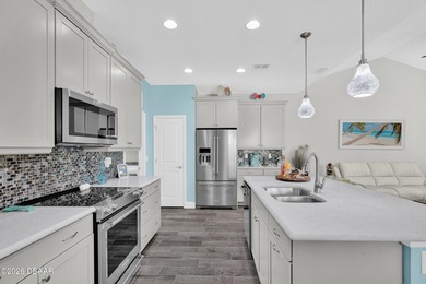 Beautiful Turn-Key Camellia Cottage offering 2 bedrooms, 2 baths on LPGA International Golf Course in Florida - for sale on GolfHomes.com, golf home, golf lot