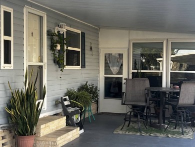 This beautifully updated 2-bedroom, 2-bathroom unfurnished home on Lake Henry Golf Club in Florida - for sale on GolfHomes.com, golf home, golf lot