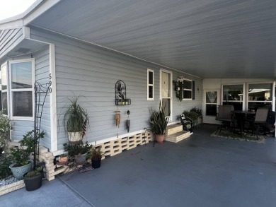 This beautifully updated 2-bedroom, 2-bathroom unfurnished home on Lake Henry Golf Club in Florida - for sale on GolfHomes.com, golf home, golf lot