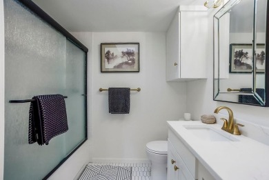 Inside the Private Gates of Lake Quivira! Discover this charming on Lake Quivira Country Club in Kansas - for sale on GolfHomes.com, golf home, golf lot