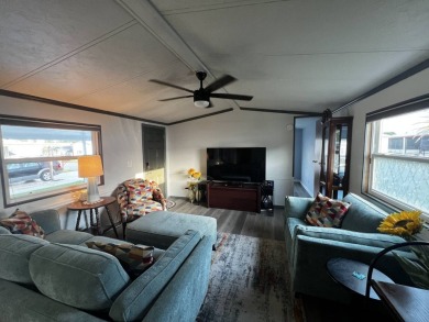 This beautifully updated 2-bedroom, 2-bathroom unfurnished home on Lake Henry Golf Club in Florida - for sale on GolfHomes.com, golf home, golf lot