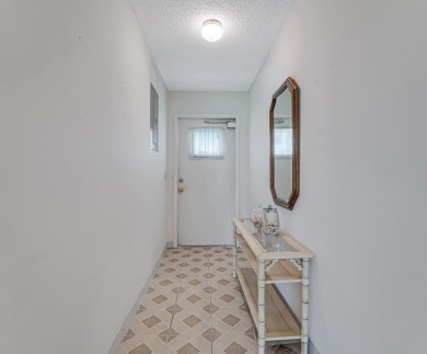Welcome to this charming condo located in the desirable Palm on Leisureville Community Golf Course in Florida - for sale on GolfHomes.com, golf home, golf lot