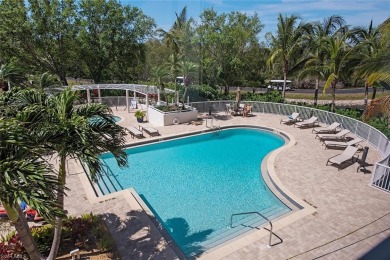 MAJOR PRICE ADJUSTMENT!!! Fabulous first floor end on Club at Pelican Bay Golf Course in Florida - for sale on GolfHomes.com, golf home, golf lot