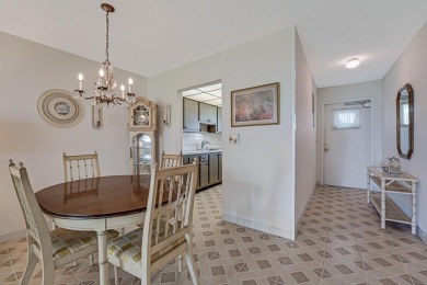 Welcome to this charming condo located in the desirable Palm on Leisureville Community Golf Course in Florida - for sale on GolfHomes.com, golf home, golf lot