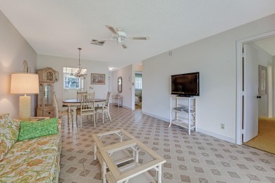 Welcome to this charming condo located in the desirable Palm on Leisureville Community Golf Course in Florida - for sale on GolfHomes.com, golf home, golf lot