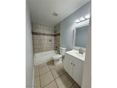 Discover this move-in-ready gem where every major system has on Copperhead Golf Club in Florida - for sale on GolfHomes.com, golf home, golf lot