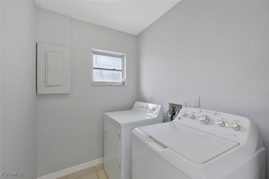 Discover this move-in-ready gem where every major system has on Copperhead Golf Club in Florida - for sale on GolfHomes.com, golf home, golf lot