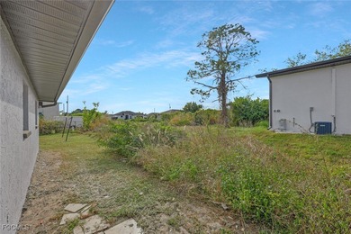 Discover this move-in-ready gem where every major system has on Copperhead Golf Club in Florida - for sale on GolfHomes.com, golf home, golf lot