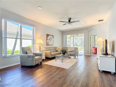 This sunny END UNIT attached villa in HERONS GLEN COUNTRY CLUB's on Herons Glen Golf and Country Club in Florida - for sale on GolfHomes.com, golf home, golf lot