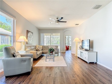 This sunny END UNIT attached villa in HERONS GLEN COUNTRY CLUB's on Herons Glen Golf and Country Club in Florida - for sale on GolfHomes.com, golf home, golf lot