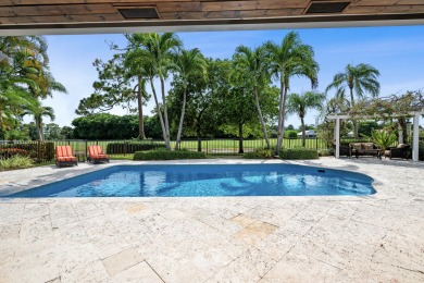 Welcome to 10984 Boca Woods Lane, an exquisite residence nestled on Boca Woods Country Club in Florida - for sale on GolfHomes.com, golf home, golf lot