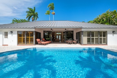 Welcome to 10984 Boca Woods Lane, an exquisite residence nestled on Boca Woods Country Club in Florida - for sale on GolfHomes.com, golf home, golf lot