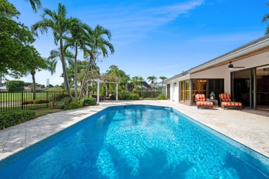 Welcome to 10984 Boca Woods Lane, an exquisite residence nestled on Boca Woods Country Club in Florida - for sale on GolfHomes.com, golf home, golf lot