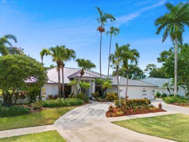 Welcome to 10984 Boca Woods Lane, an exquisite residence nestled on Boca Woods Country Club in Florida - for sale on GolfHomes.com, golf home, golf lot