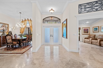 Welcome to 10984 Boca Woods Lane, an exquisite residence nestled on Boca Woods Country Club in Florida - for sale on GolfHomes.com, golf home, golf lot