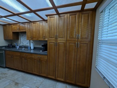 Experience Florida living at its finest in this exceptionally on Bayou Golf Club in Florida - for sale on GolfHomes.com, golf home, golf lot