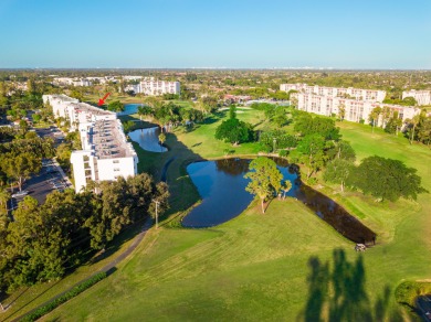 WELCOME TO THIS CONDO WITH BEAUTIFUL WATER,GARDEN & GOLF VIEWS on Poinciana Golf Club in Florida - for sale on GolfHomes.com, golf home, golf lot