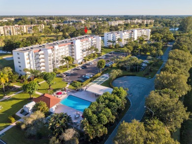 WELCOME TO THIS CONDO WITH BEAUTIFUL WATER,GARDEN & GOLF VIEWS on Poinciana Golf Club in Florida - for sale on GolfHomes.com, golf home, golf lot