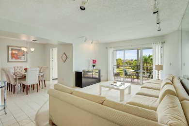 WELCOME TO THIS CONDO WITH BEAUTIFUL WATER,GARDEN & GOLF VIEWS on Poinciana Golf Club in Florida - for sale on GolfHomes.com, golf home, golf lot