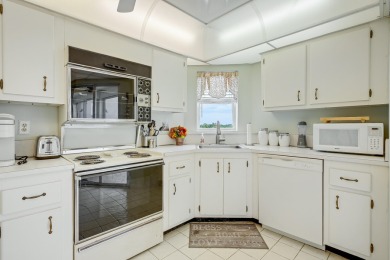 WELCOME TO THIS CONDO WITH BEAUTIFUL WATER,GARDEN & GOLF VIEWS on Poinciana Golf Club in Florida - for sale on GolfHomes.com, golf home, golf lot