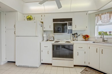 WELCOME TO THIS CONDO WITH BEAUTIFUL WATER,GARDEN & GOLF VIEWS on Poinciana Golf Club in Florida - for sale on GolfHomes.com, golf home, golf lot