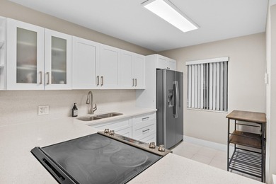 Wake up to tranquil lake and golf course views in this on Fountains Golf and Country Club in Florida - for sale on GolfHomes.com, golf home, golf lot