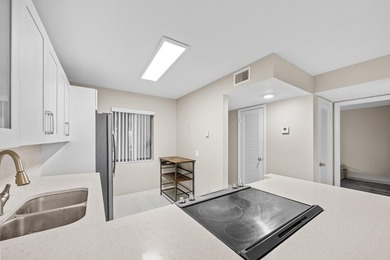 Wake up to tranquil lake and golf course views in this on Fountains Golf and Country Club in Florida - for sale on GolfHomes.com, golf home, golf lot