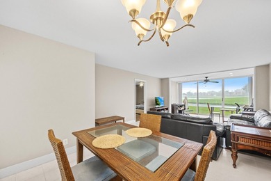 Wake up to tranquil lake and golf course views in this on Fountains Golf and Country Club in Florida - for sale on GolfHomes.com, golf home, golf lot