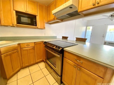 Spacious, clean 2 bed/1.5 bath/2 parking (open), centrally on Mililani Golf Club in Hawaii - for sale on GolfHomes.com, golf home, golf lot