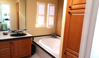 Step into comfort and style with this generously sized 3-bedroom on Schalamar Creek Golf and Country Club in Florida - for sale on GolfHomes.com, golf home, golf lot