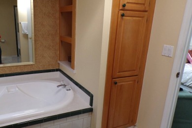 Step into comfort and style with this generously sized 3-bedroom on Schalamar Creek Golf and Country Club in Florida - for sale on GolfHomes.com, golf home, golf lot