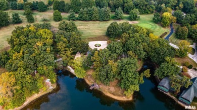 Nestled along the tranquil shores of a pristine lake, this on Carlinville Country Club in Illinois - for sale on GolfHomes.com, golf home, golf lot