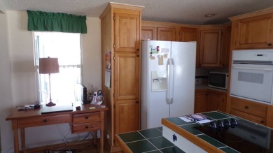 Step into comfort and style with this generously sized 3-bedroom on Schalamar Creek Golf and Country Club in Florida - for sale on GolfHomes.com, golf home, golf lot
