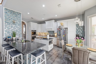 Gorgeous executive home located in the Exclusive Gated Community on Bay Point Resort Golf Club in Florida - for sale on GolfHomes.com, golf home, golf lot