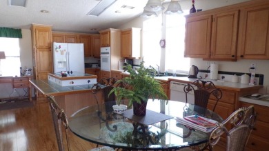 Step into comfort and style with this generously sized 3-bedroom on Schalamar Creek Golf and Country Club in Florida - for sale on GolfHomes.com, golf home, golf lot