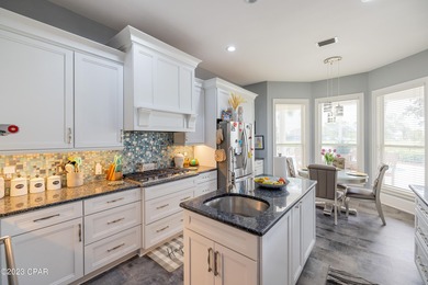 Gorgeous executive home located in the Exclusive Gated Community on Bay Point Resort Golf Club in Florida - for sale on GolfHomes.com, golf home, golf lot