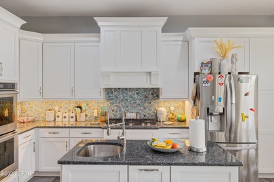 Gorgeous executive home located in the Exclusive Gated Community on Bay Point Resort Golf Club in Florida - for sale on GolfHomes.com, golf home, golf lot