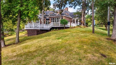 Nestled along the tranquil shores of a pristine lake, this on Carlinville Country Club in Illinois - for sale on GolfHomes.com, golf home, golf lot