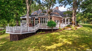 Nestled along the tranquil shores of a pristine lake, this on Carlinville Country Club in Illinois - for sale on GolfHomes.com, golf home, golf lot