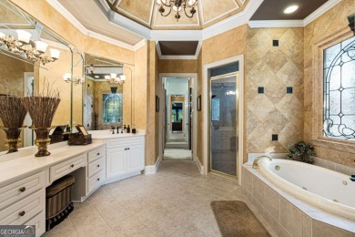 Experience refined St Marlo Country Club living at its finest in on St. Marlo Country Club in Georgia - for sale on GolfHomes.com, golf home, golf lot