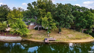 Nestled along the tranquil shores of a pristine lake, this on Carlinville Country Club in Illinois - for sale on GolfHomes.com, golf home, golf lot