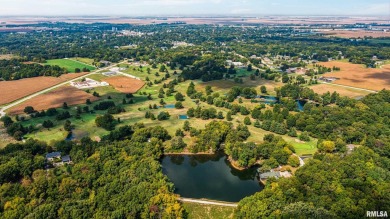 Nestled along the tranquil shores of a pristine lake, this on Carlinville Country Club in Illinois - for sale on GolfHomes.com, golf home, golf lot