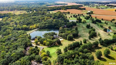 Nestled along the tranquil shores of a pristine lake, this on Carlinville Country Club in Illinois - for sale on GolfHomes.com, golf home, golf lot