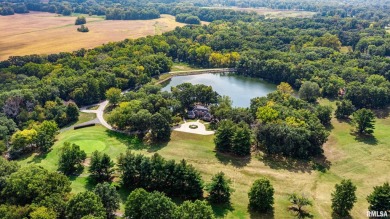 Nestled along the tranquil shores of a pristine lake, this on Carlinville Country Club in Illinois - for sale on GolfHomes.com, golf home, golf lot