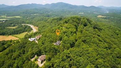 Experience serene living with panoramic mountain and golf course on Brasstown Valley Resort and Spa in Georgia - for sale on GolfHomes.com, golf home, golf lot